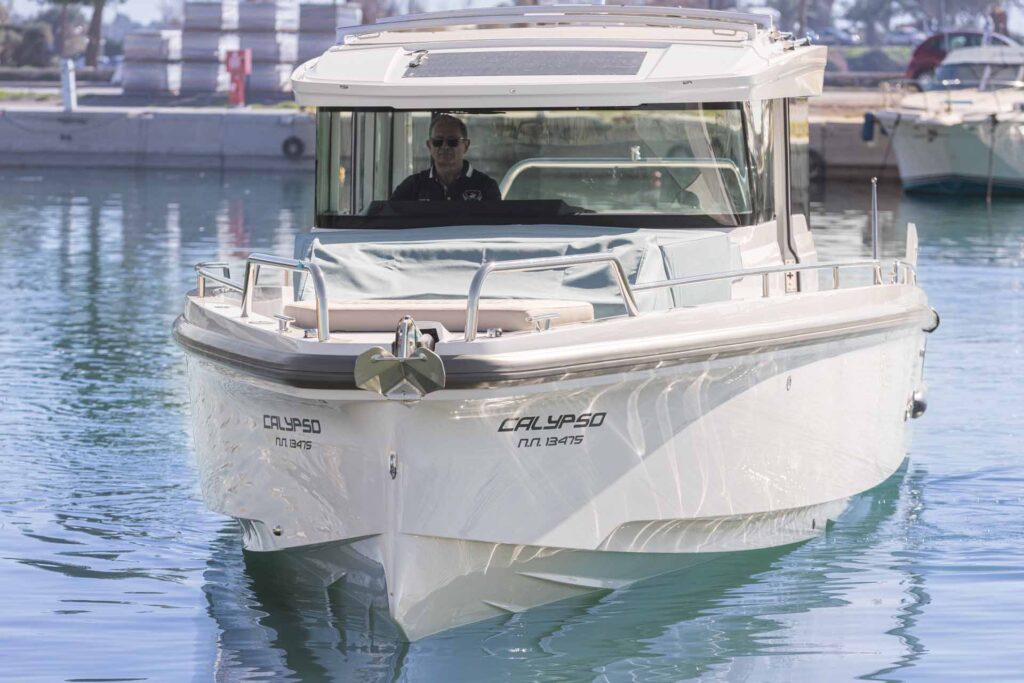 The Calypso yacht departing