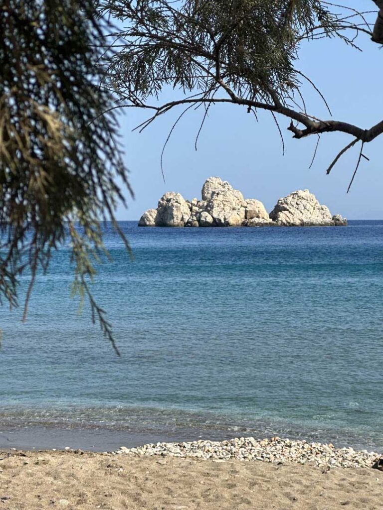 Rocks in the sea viewed from the beach
