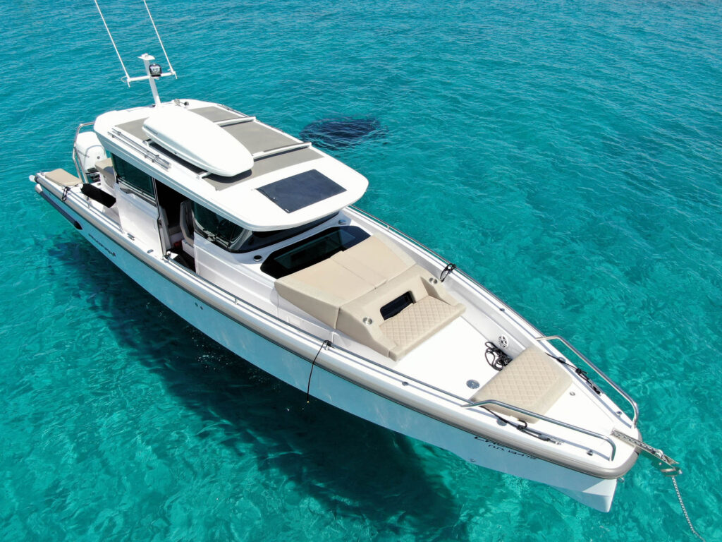The Calypso anchored in turquoise waters